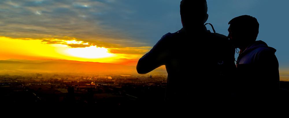 two students viewing sunset